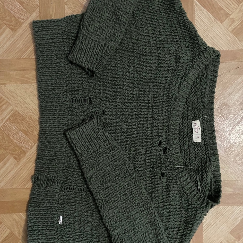 Green distressed sweater